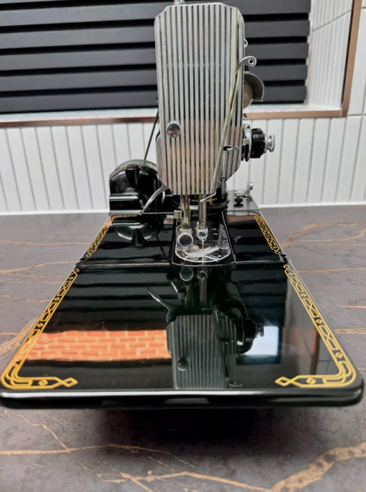 Red "S" Sewing Machine